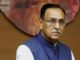 Rupani files nomination papers, targets Congress