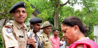 Chief Minister, Vasundhara Raje, holds, commandos, Rakhi