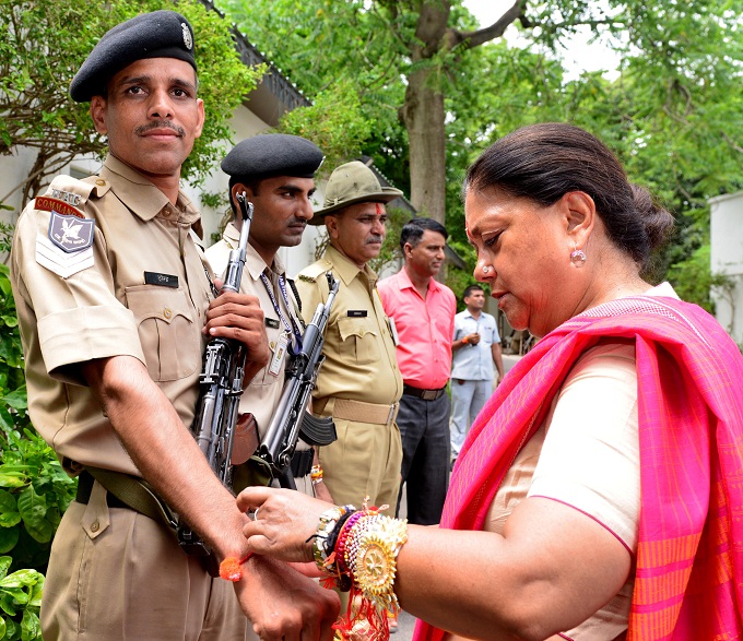 Chief Minister, Vasundhara Raje, holds, commandos, Rakhi Chief Minister, Vasundhara Raje, holds, commandos, Rakhi
